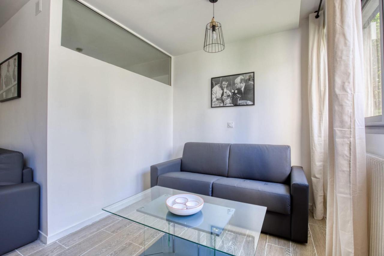 Charming Apartment In The Heart Of The 19Th Париж Екстериор снимка